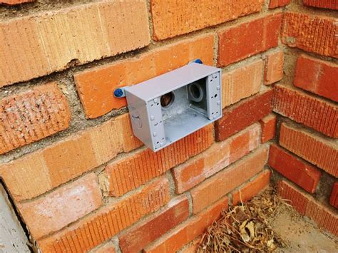 electrical box in brick|external outlet for brick wall.